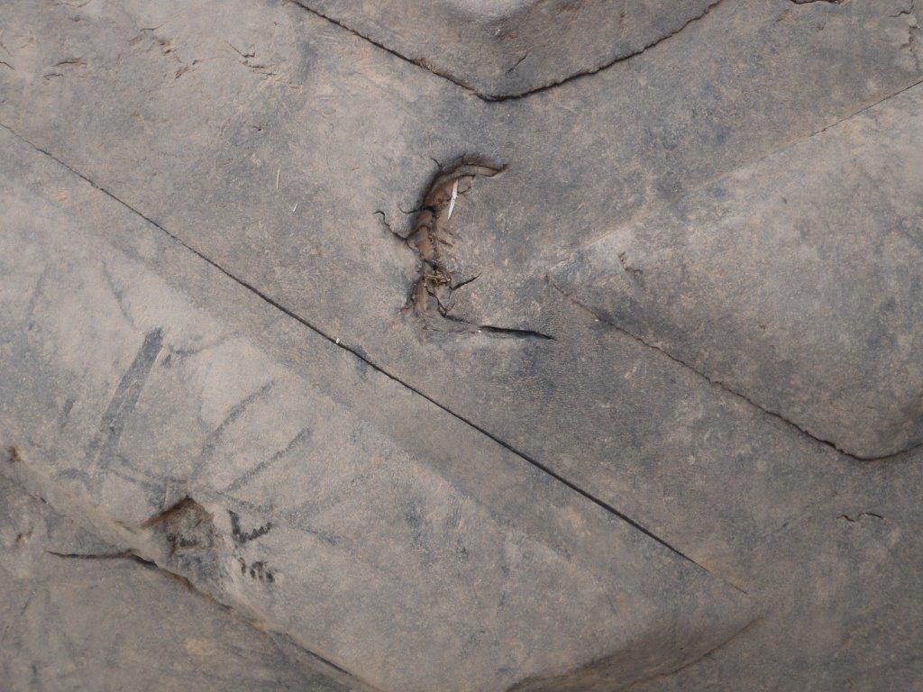 Damaged Asphalt Paver Track