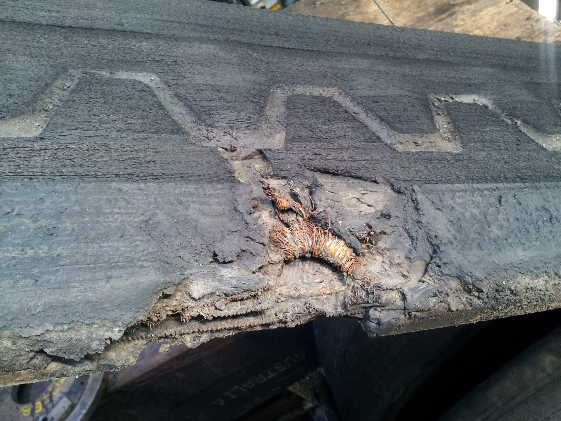 Damaged Asphalt Paver Track